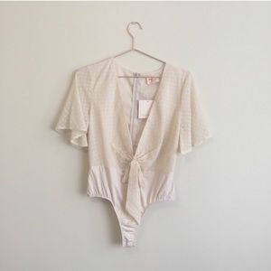 SHOWPO low cut cream Bodysuit